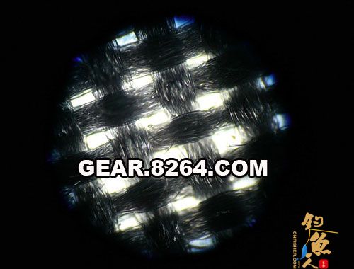 未压胶的一面,和上边的格子布是不是不大一样